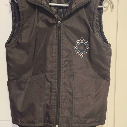 Calif sleeveless children's vest like new, black, size 13-14 years