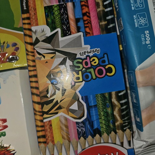 Art supplies like new with tempera, watercolors, plaster, brushes, and color papers