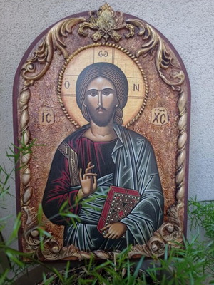 Handmade decoupage icon of Christ on MDF with relief and clay elements