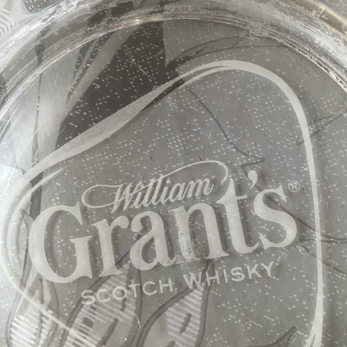 Glass ashtray used with Grant's whisky logo