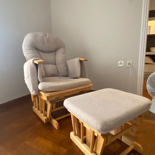 Nursing rocking chair with rocking footrest