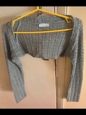 Knitted bolero gray silver like new with long sleeves