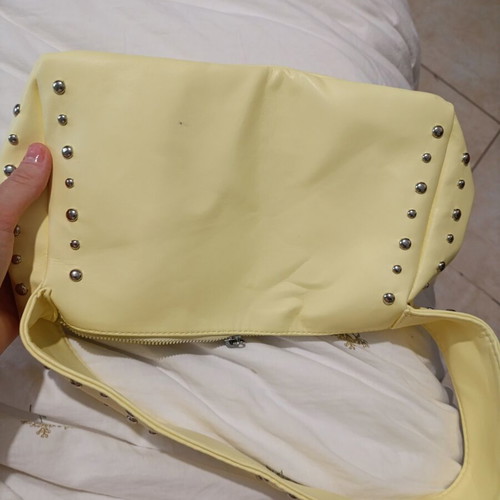 Yellow handbag with studs like new