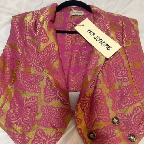 The Jerkins set new with tags, vest, bell-bottom pants and fabric belt, size M-L