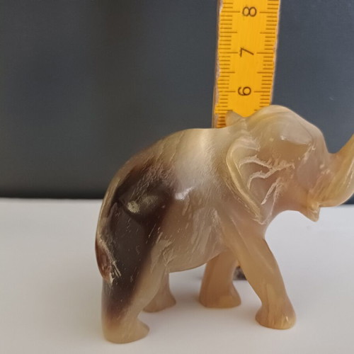 Carved elephant figurines used, set of two, missing tusks