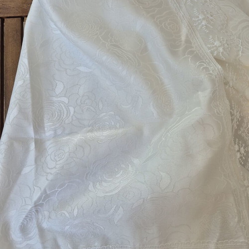 White floral tablecloth with delicate lace edges like new