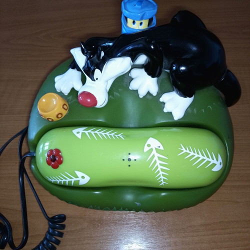 Disney collectible corded home phone used, green