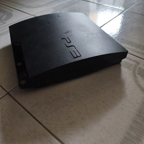 Sony PlayStation 3 Slim console like new with 2 games and cables