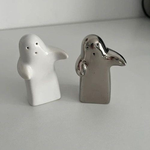 Porcelain hugging ghost salt and pepper shakers like new