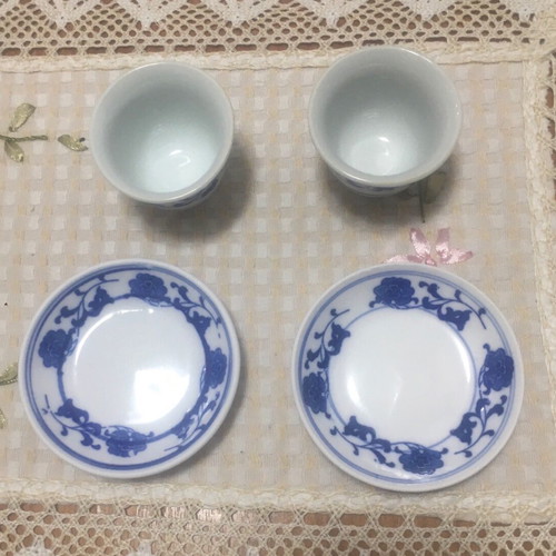 Cups without handles in bowl style with saucers, new