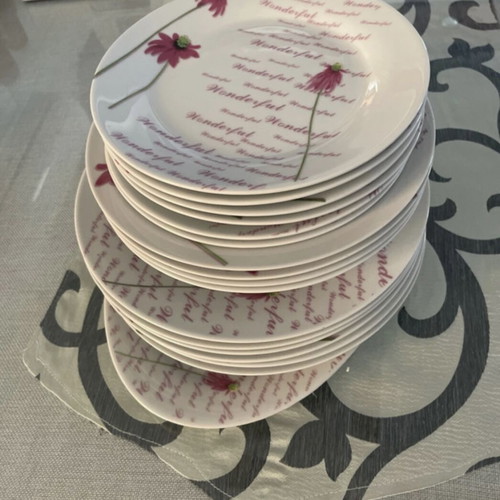 Dinnerware set like new, 6 large, 5 deep, 6 small plates and a platter