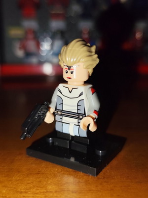 Omega Star Wars minifigure with base and blaster