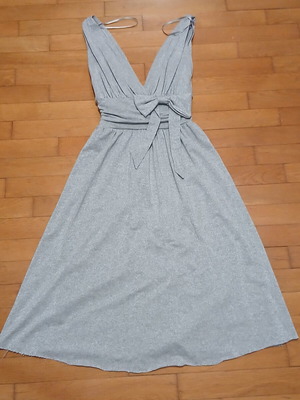 Dress gray silver with V neckline and bow tie at waist size Medium like new