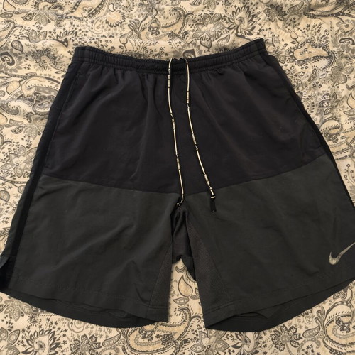 Nike running shorts size S like new, black and grey