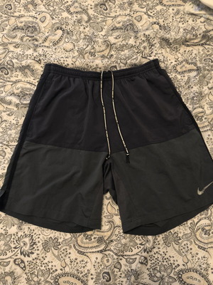 Nike running shorts size S like new, black and grey