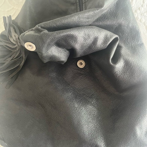 Leather backpack used with inner lining and fabric straps
