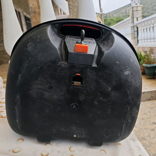 Large motorcycle top case used with key and passenger cushion