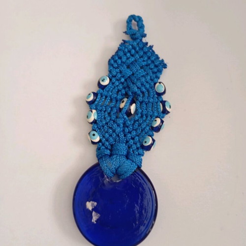 Glass eye charm used