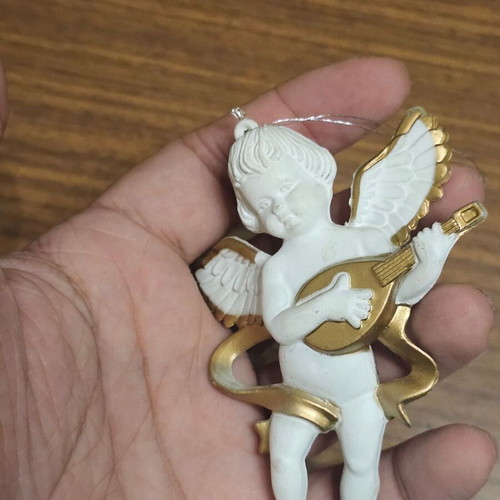 Decorative Angel used with fabric string for hanging