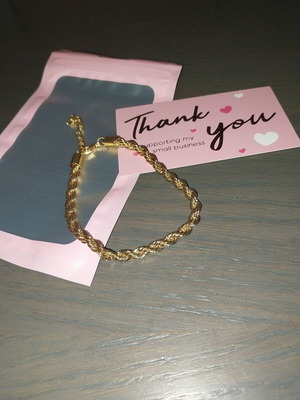 Bracelet new, gold tone