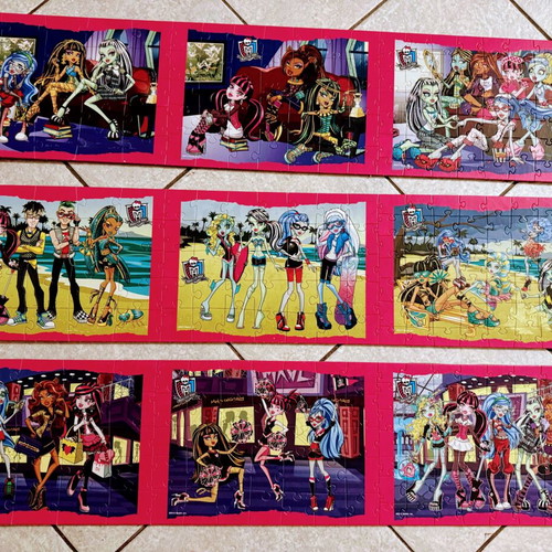 Monster High puzzle set like new, 9 glued on wood