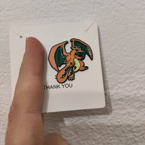 Charizard pin like new, Pokemon character