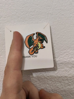 Charizard pin like new, Pokemon character