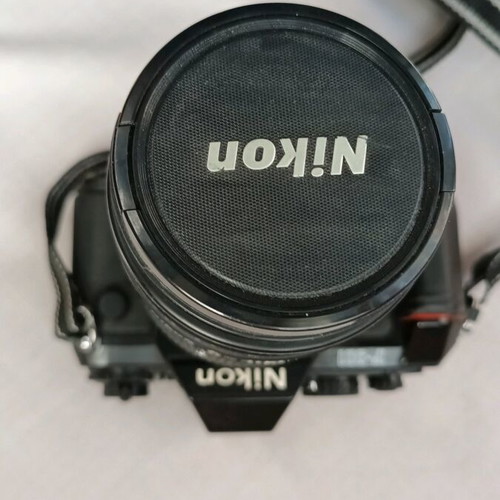Nikon F301 camera used with 35-135 lens and flash