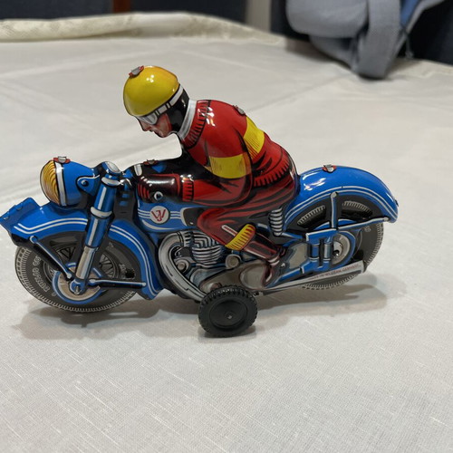 Motorcyclist tin toy like new, made in West Germany