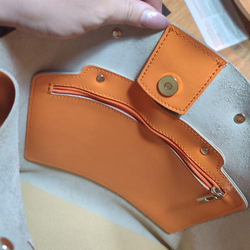 Leather handbag used, orange with multiple compartments