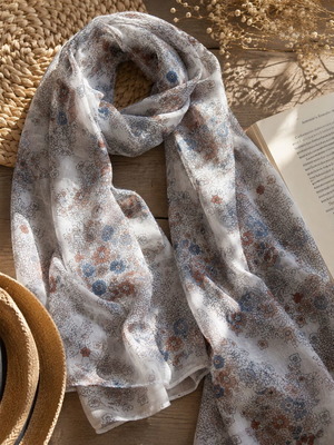 Scarf new with subtle floral design in earthy tones
