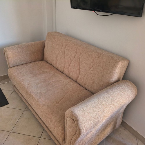 Two-seater sofa bed, beige fabric with storage