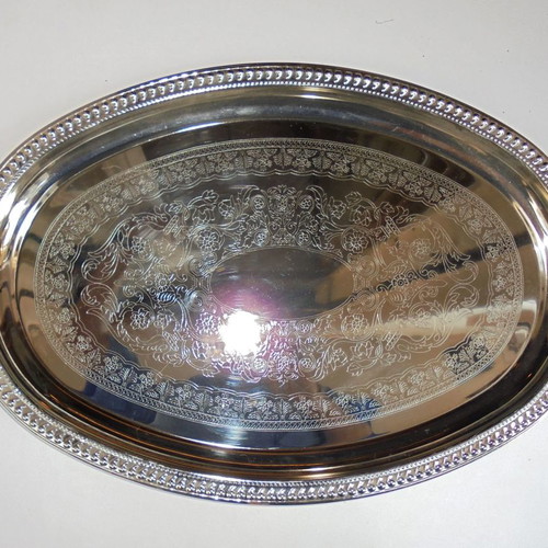 Twin Bird metal serving tray with engraved decoration