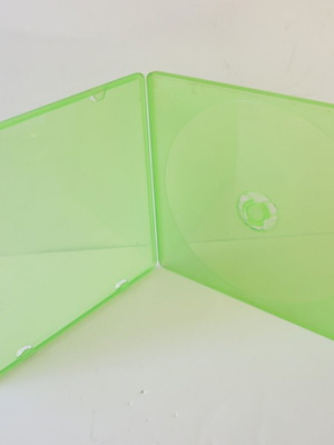 CD/DVD slim case used, green, single-piece clamshell
