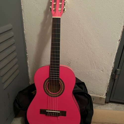 Pink children's guitar new, unused