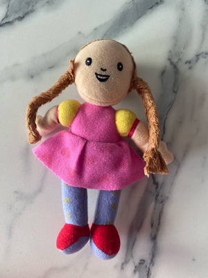 Small cloth doll used with braids