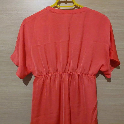 Coral satin-like blouse with V and rhinestones like new, size Medium