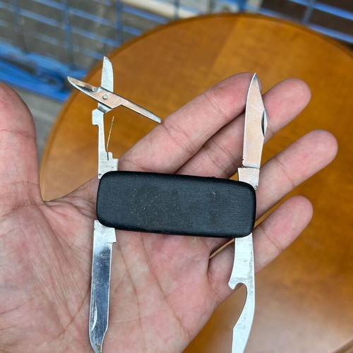 Vintage pocket multitool 4 functions with scissors and opener used