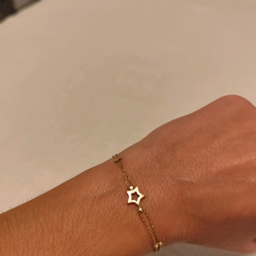 Gold star bracelet 14 karat new, gold color