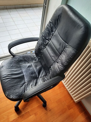 Leather office chair used, black, wheeled, swivel