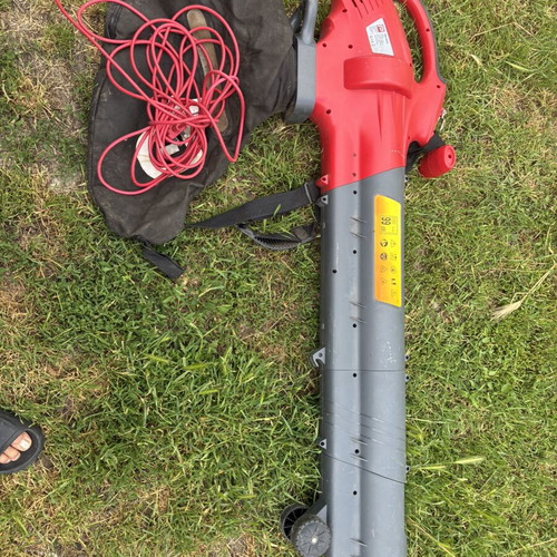 Leaf collector like new, blows and collects leaves and debris