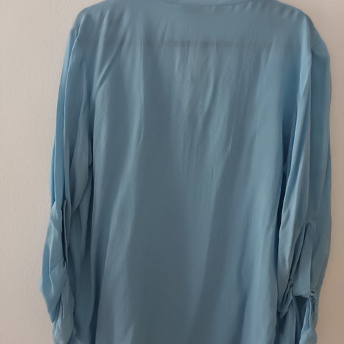 Shirt sky blue new, size L fits better M