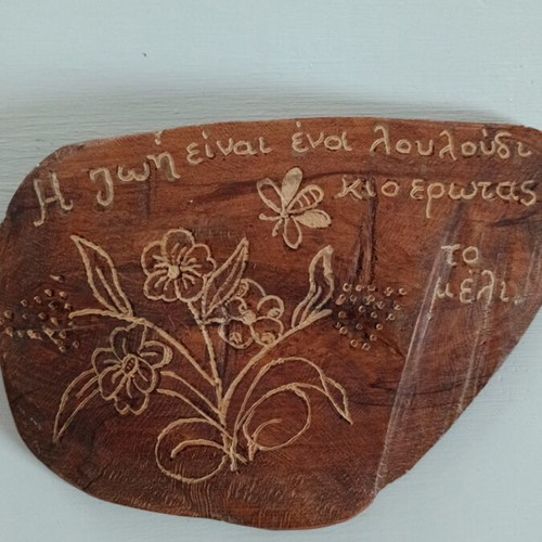 Handmade carved wooden sign used