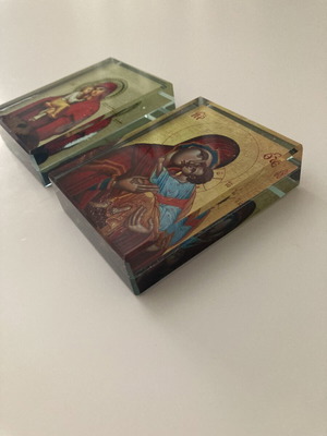 Glass religious icons used, set of two crystal blocks
