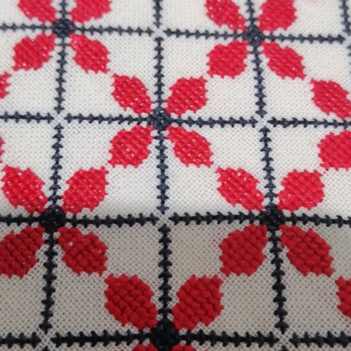 Large embroidered table runner used with handmade lace