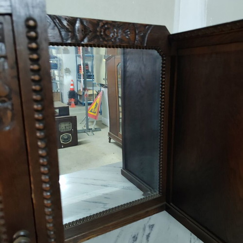 Carved antique buffet used with marble top and mirror