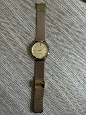 Oozoo wristwatch used, gold color, needs cleaning and battery