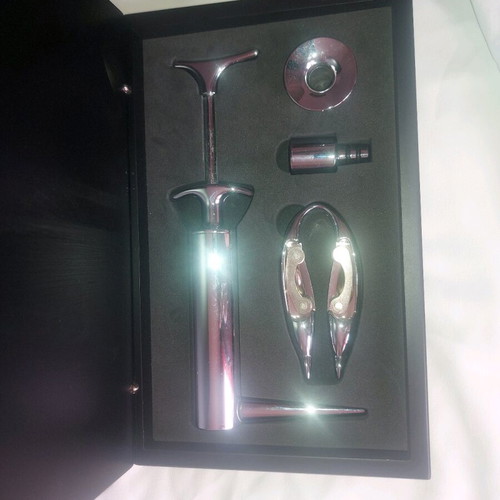 Wine opener set like new with wooden case