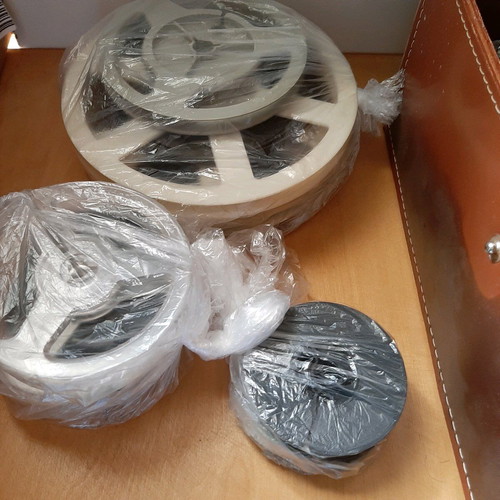 Russian projector used with leather case and film