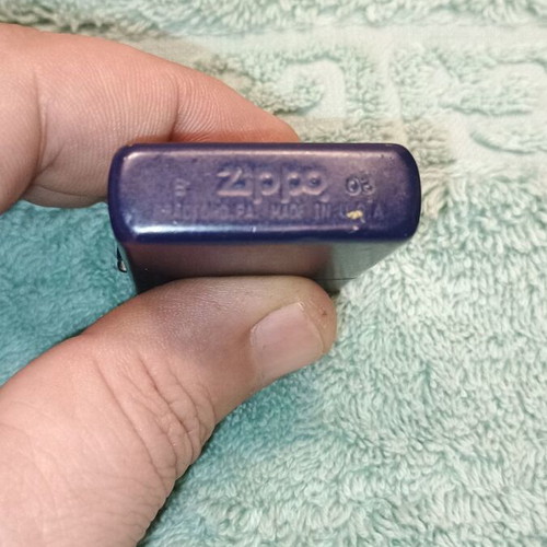 Zippo lighter used blue with purple logo